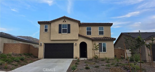 19427 Seeding Palace Cir, Riverside, CA 92507 - view of front of property with stucco siding, a tile roof, concrete driveway, and an attached garage