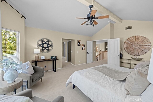 45422 Camino Monzon, Temecula, CA 92592 - bedroom featuring light carpet, beam ceiling, baseboards, a ceiling fan, and high vaulted ceiling