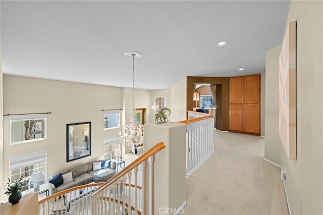 45422 Camino Monzon, Temecula, CA 92592 - hallway with an upstairs landing, light carpet, recessed lighting, and healthy amount of natural light