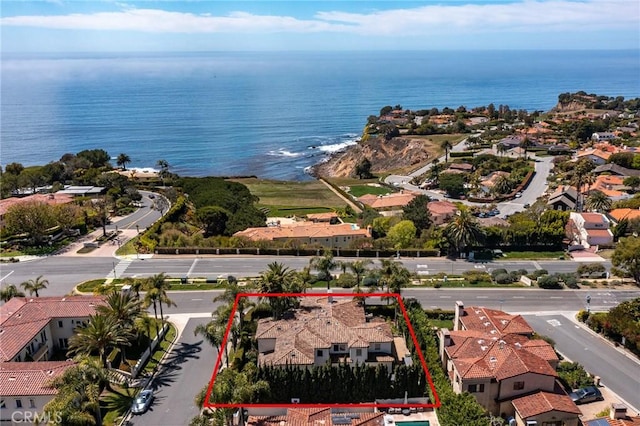 bird's eye view with a water view and a residential view