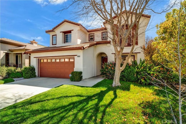 28514 High Ridge Dr, Saugus, CA 91390 - mediterranean / spanish-style house featuring a front yard, driveway, and stucco siding