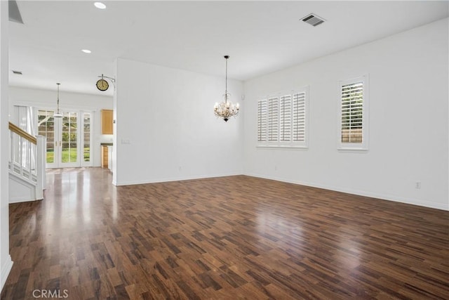 28514 High Ridge Dr, Saugus, CA 91390 - unfurnished room featuring a chandelier, visible vents, dark wood-style floors, and a healthy amount of sunlight