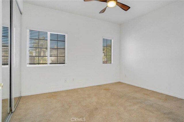 28514 High Ridge Dr, Saugus, CA 91390 - empty room featuring baseboards, a ceiling fan, and carpet