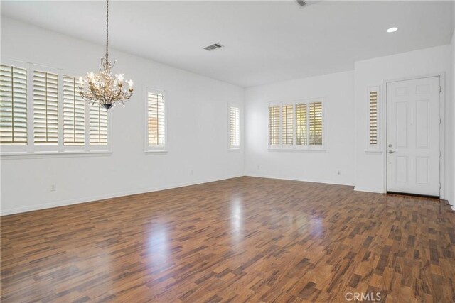 28514 High Ridge Dr, Saugus, CA 91390 - interior space with visible vents, baseboards, a notable chandelier, and wood finished floors