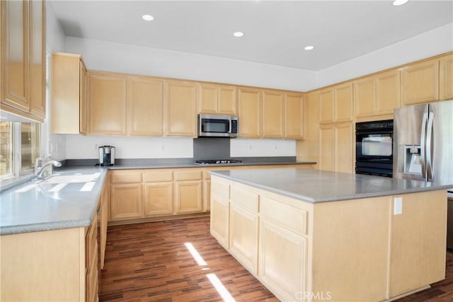 28514 High Ridge Dr, Saugus, CA 91390 - kitchen with a center island, a sink, light brown cabinetry, dark wood finished floors, and stainless steel appliances