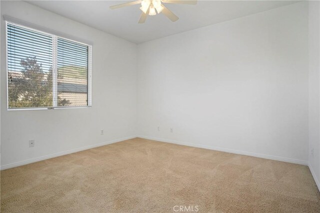 28514 High Ridge Dr, Saugus, CA 91390 - unfurnished room featuring ceiling fan, light colored carpet, and baseboards