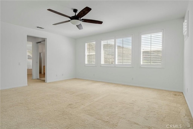 28514 High Ridge Dr, Saugus, CA 91390 - unfurnished room featuring light colored carpet, baseboards, a ceiling fan, and visible vents