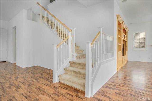 28514 High Ridge Dr, Saugus, CA 91390 - stairs with a high ceiling and wood finished floors