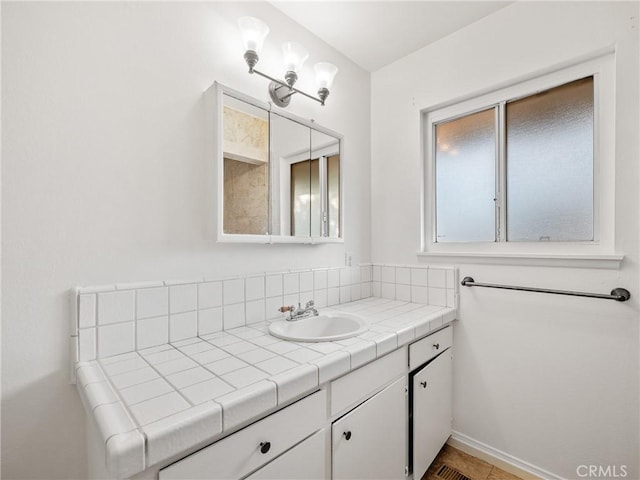 14435 Hopi Rd, Apple Valley, CA 92307 - bathroom with vanity and baseboards