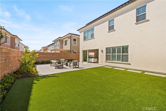 108 Hyperion, Irvine, CA 92618 - back of property with outdoor lounge area, a fenced backyard, stucco siding, a patio area, and a lawn