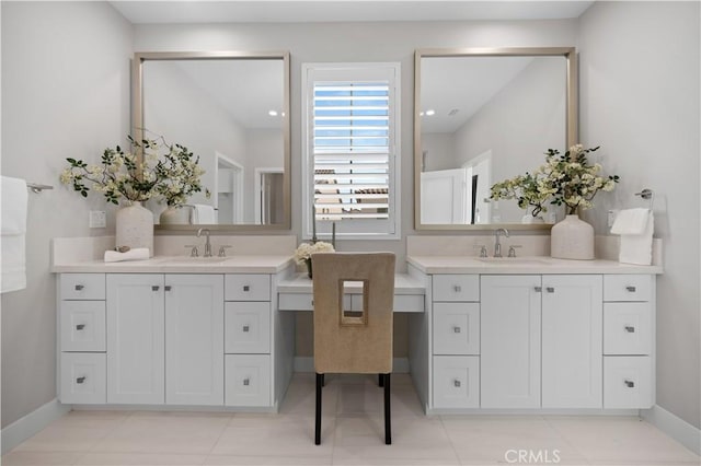 108 Hyperion, Irvine, CA 92618 - bathroom with two vanities, a sink, and baseboards