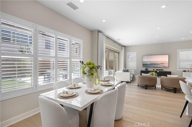 108 Hyperion, Irvine, CA 92618 - dining room with recessed lighting, light wood-style floors, a wealth of natural light, and visible vents