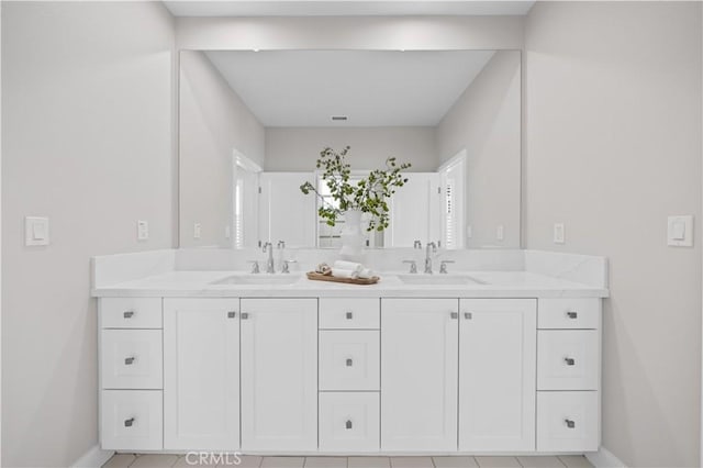 108 Hyperion, Irvine, CA 92618 - full bath featuring baseboards, a sink, and double vanity