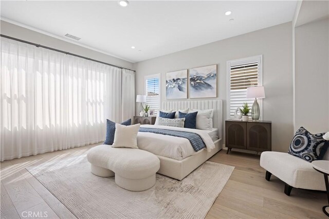 108 Hyperion, Irvine, CA 92618 - bedroom with visible vents, recessed lighting, and light wood-style floors