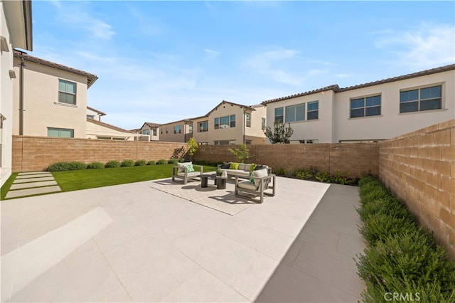 108 Hyperion, Irvine, CA 92618 - view of patio / terrace featuring a fenced backyard, an outdoor hangout area, and a residential view