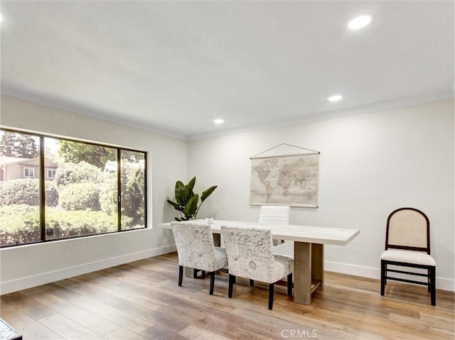 office area with ornamental molding, baseboards, recessed lighting, and wood finished floors