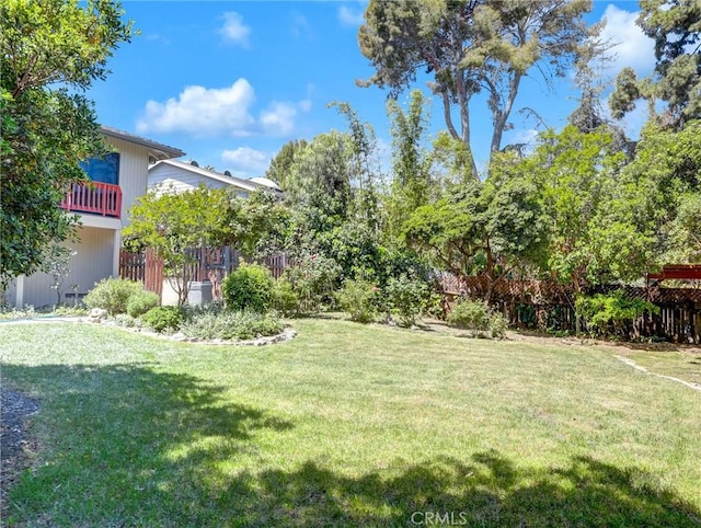view of yard with fence