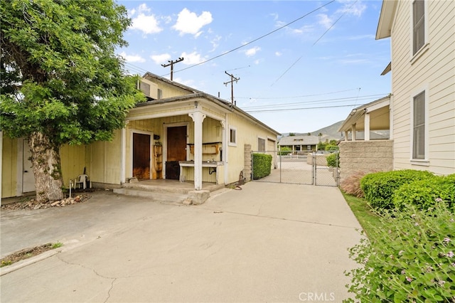 exterior space with fence and a gate