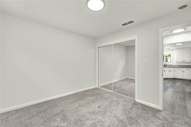 217 N Sacramento, Willows, CA 95988 - unfurnished bedroom with baseboards, a closet, and carpet floors