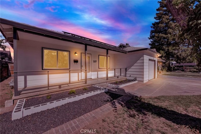 217 N Sacramento, Willows, CA 95988 - single story home with driveway, an attached garage, and covered porch