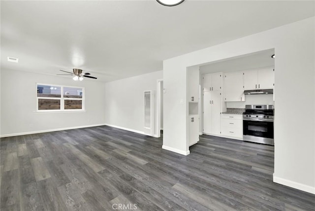 217 N Sacramento, Willows, CA 95988 - unfurnished living room with dark wood-style floors, ceiling fan, and baseboards