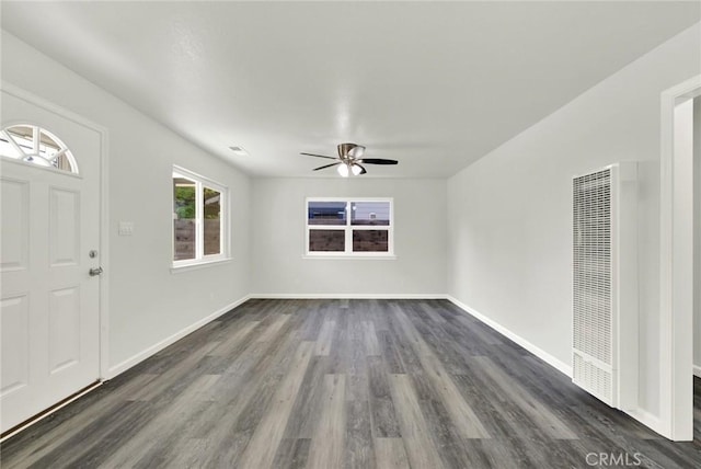 217 N Sacramento, Willows, CA 95988 - foyer entrance featuring a heating unit, a ceiling fan, dark wood-style floors, and baseboards
