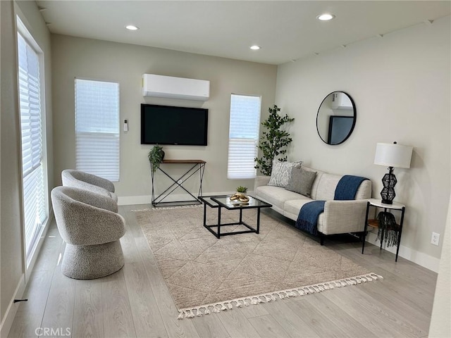 2209 W Glendon Way, Alhambra, CA 91803 - living room with a wall mounted air conditioner, baseboards, wood finished floors, and recessed lighting