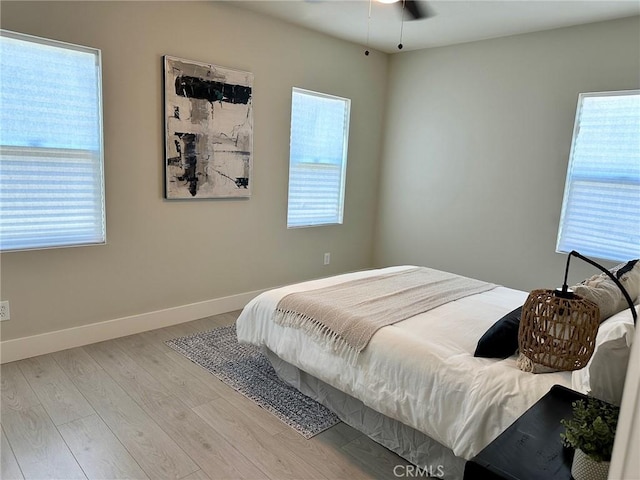 2209 W Glendon Way, Alhambra, CA 91803 - bedroom with wood finished floors, multiple windows, and baseboards