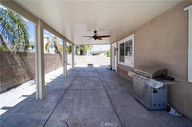 view of patio / terrace featuring a fenced backyard and a ceiling fan