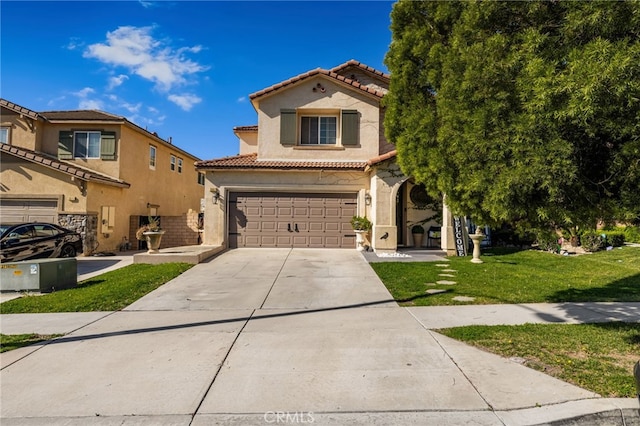 view of front of property featuring stucco siding, driveway, a front yard, a garage, and a tiled roof