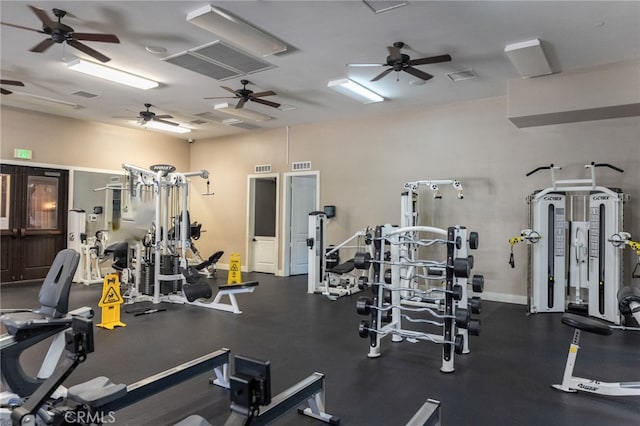 workout area with ceiling fan and visible vents