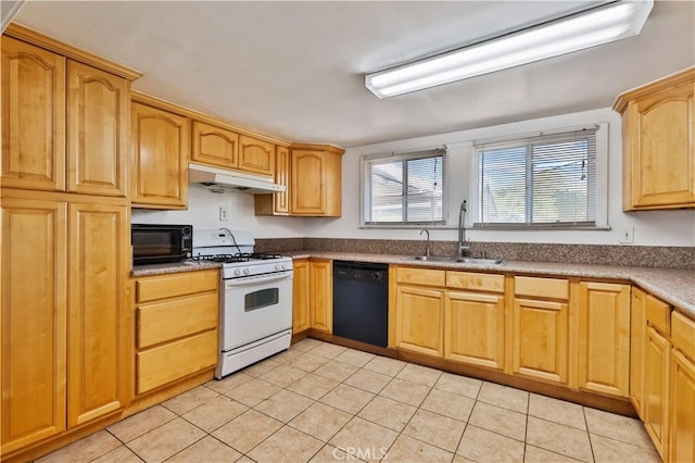 kitchen with light tile patterned floors, black appliances, under cabinet range hood, a sink, and light brown cabinets