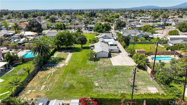 bird's eye view with a mountain view and a residential view