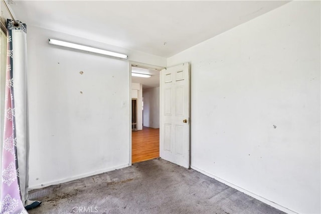 spare room with carpet flooring