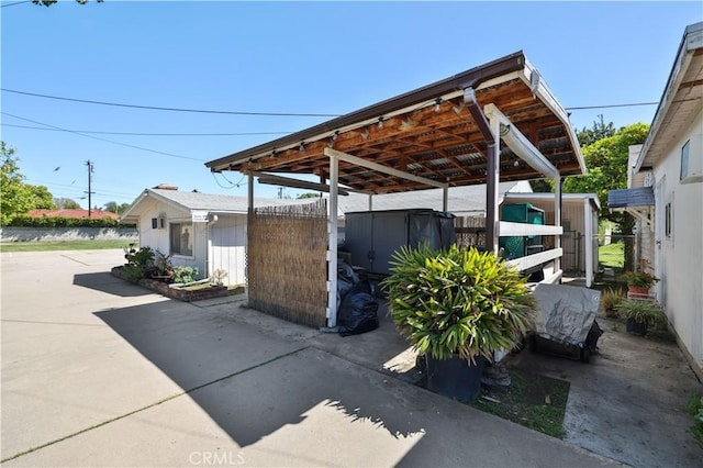 view of patio featuring a detached carport