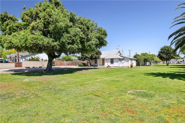 view of yard featuring fence