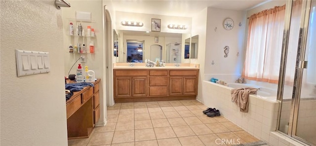 37280 Parkway Dr, Beaumont, CA 92223 - bathroom with tile patterned floors, a bath, a shower stall, and double vanity