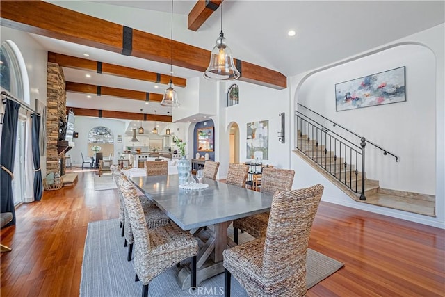424 Camino De Encanto, Redondo Beach, CA 90277 - dining space featuring wood finished floors, recessed lighting, stairway, beamed ceiling, and arched walkways