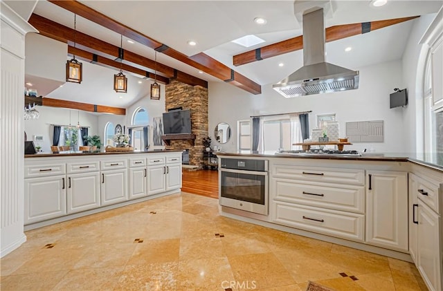 424 Camino De Encanto, Redondo Beach, CA 90277 - kitchen featuring white cabinetry, a peninsula, island range hood, beamed ceiling, and oven