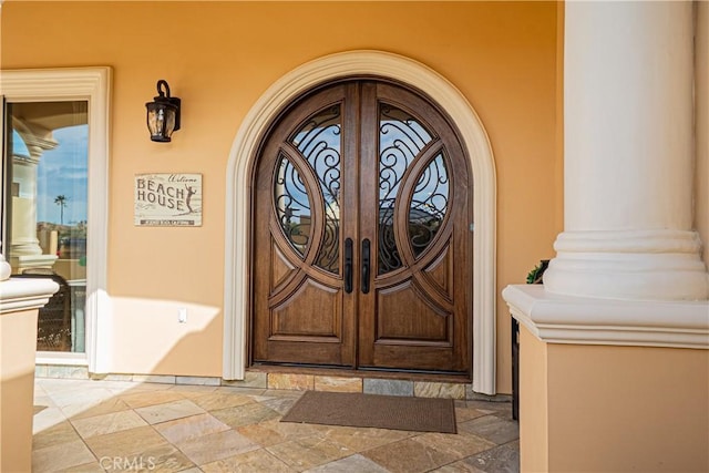 424 Camino De Encanto, Redondo Beach, CA 90277 - doorway to property featuring stucco siding, french doors, and a porch