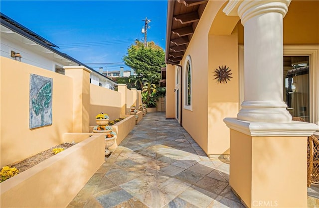 424 Camino De Encanto, Redondo Beach, CA 90277 - view of side of home featuring a patio area, stucco siding, and fence