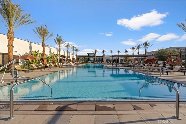 pool with a patio area