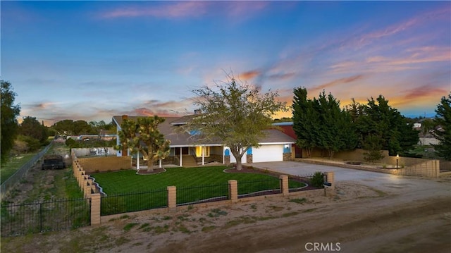 41018 40th St W, Palmdale, CA 93551 - view of front of property with concrete driveway, an attached garage, and covered porch
