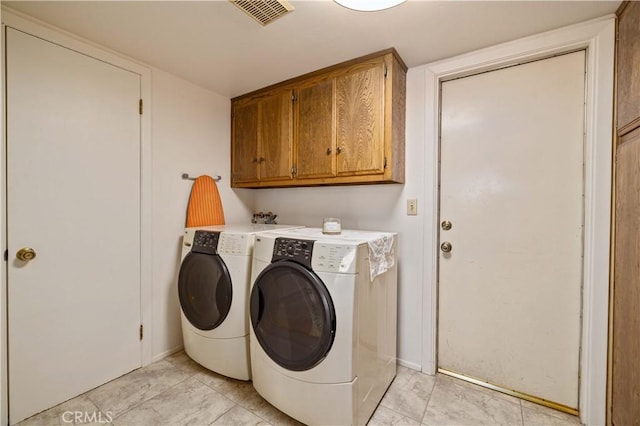 41018 40th St W, Palmdale, CA 93551 - laundry area featuring independent washer and dryer and cabinet space