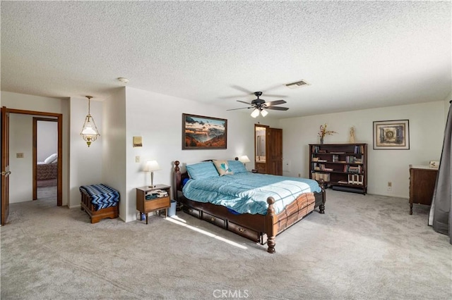 41018 40th St W, Palmdale, CA 93551 - carpeted bedroom with a textured ceiling and a ceiling fan