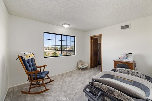 41018 40th St W, Palmdale, CA 93551 - carpeted bedroom featuring a textured ceiling and baseboards