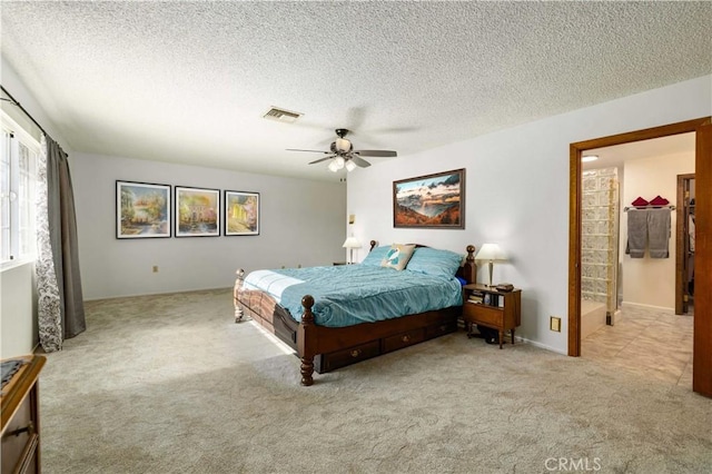 41018 40th St W, Palmdale, CA 93551 - carpeted bedroom with a textured ceiling and ceiling fan