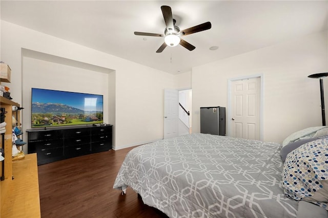 5384 Palestrina Way, Fontana, CA 92336 - bedroom with dark wood-style floors and ceiling fan