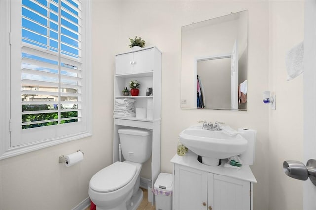 5384 Palestrina Way, Fontana, CA 92336 - bathroom with toilet, vanity, and baseboards