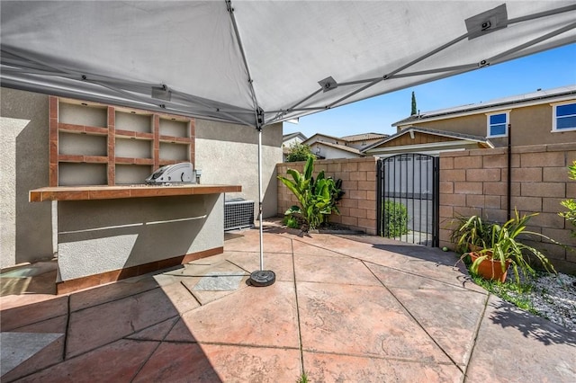 5384 Palestrina Way, Fontana, CA 92336 - view of patio / terrace with fence and a gate